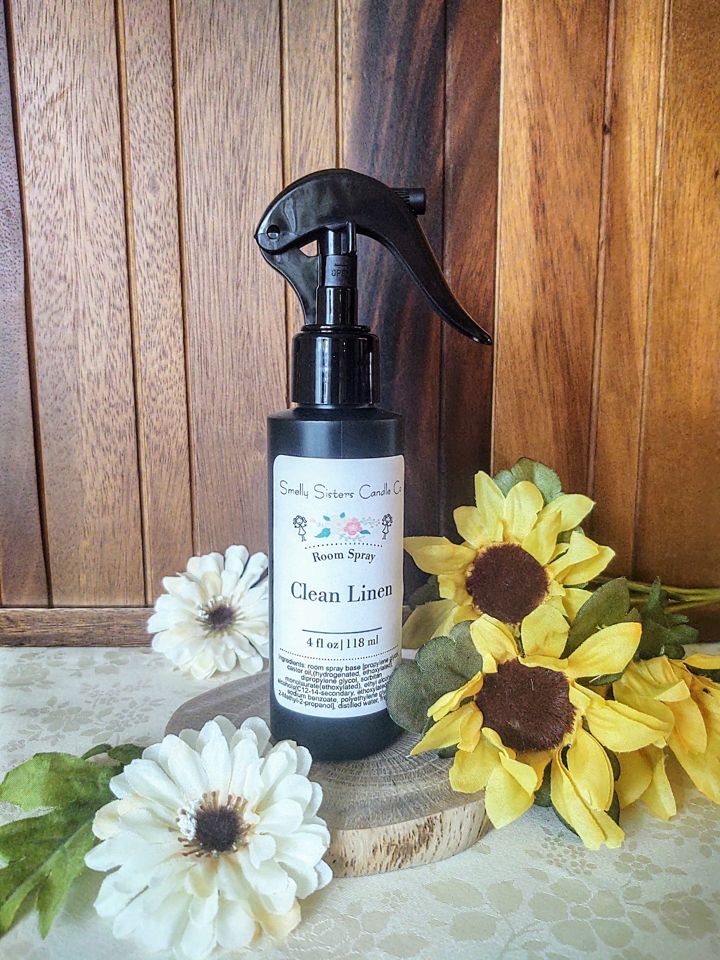 A black plastic bottle with a fine mist spray nozzle. Clean linen scented room spray. Phthalate free fragrances.