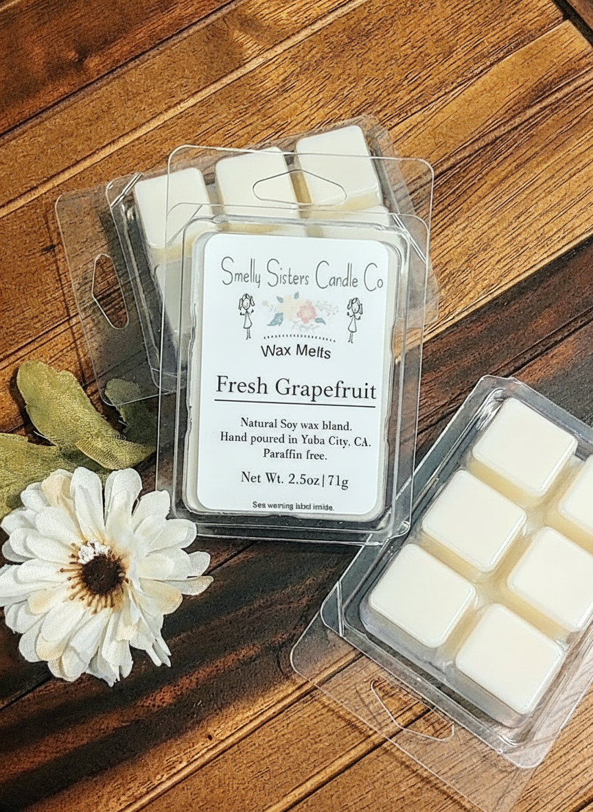 Front view of a package of soy wax melts scented fresh grapefruit. Dye free and Paraffin free. Beeswax. Cleaner.